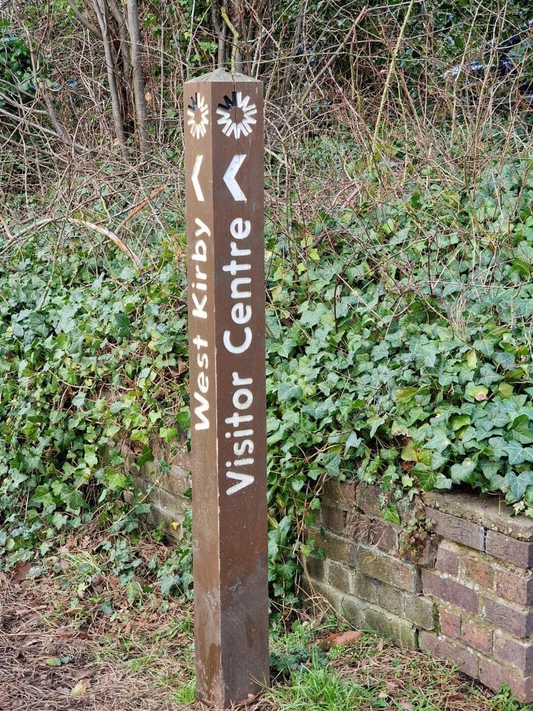 sign post on the Wirral way in Thurstaston visitor centre